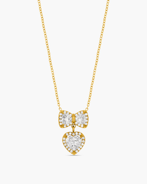Gold necklace with heart-shaped pendants on a white background