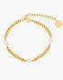 Gold chain bracelet with pearls on a white background