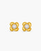Pair of gold earrings with pearl centers on a white background