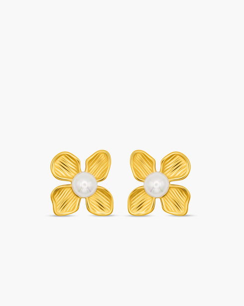 Gold flower-shaped earrings with pearl centers on a white background