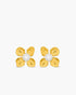 Gold flower-shaped earrings with pearl centers on a white background