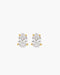 Pair of pear-shaped crystal earrings with gold accents on a white background
