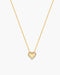 Gold necklace with a heart-shaped pendant on a white background