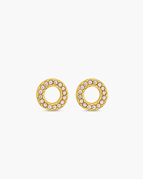Gold circular earrings with embedded stones on a white background