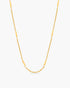 Gold chain necklace on a white background