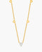 Gold necklace with a diamond pendant on a white background