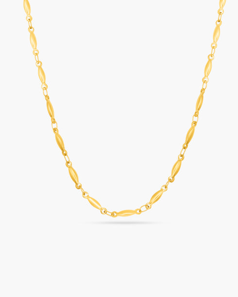 Gold chain necklace on a white background