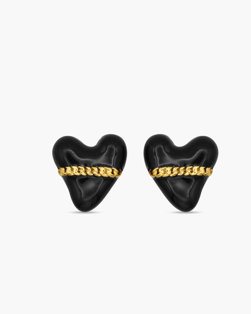 Black heart-shaped earrings with gold chains on a white background