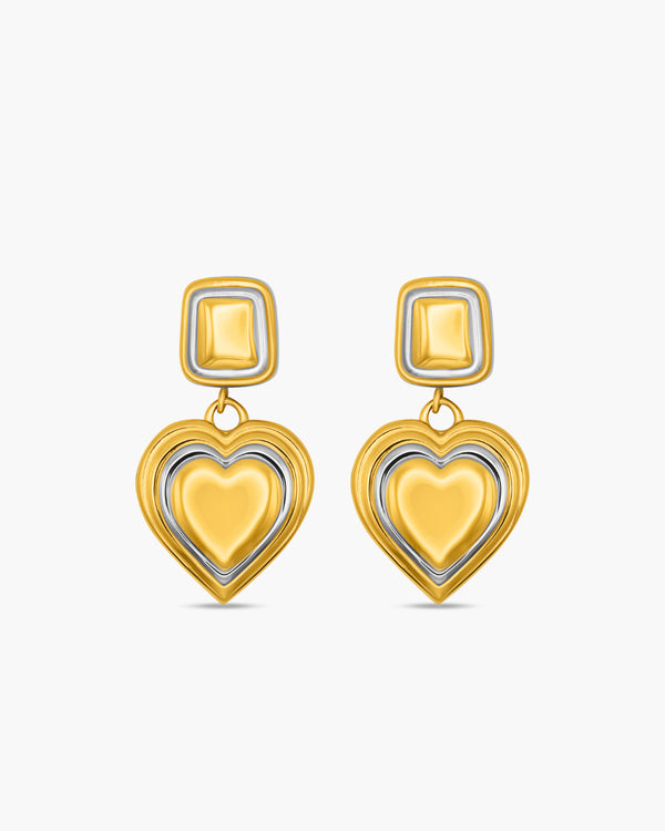 Gold heart-shaped earrings on a white background