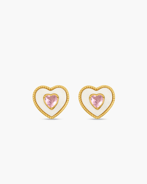 Heart-shaped earrings with pink gemstones on a white background