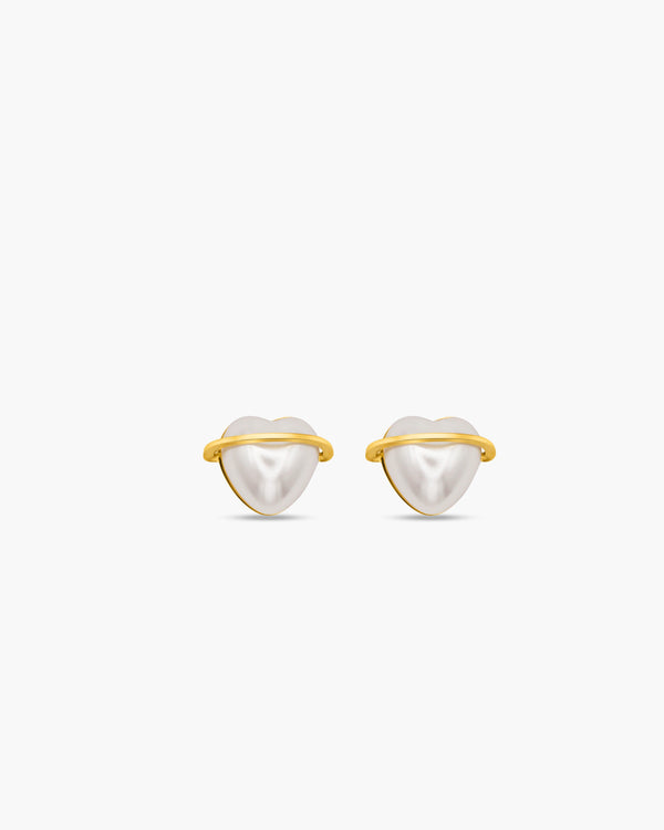 Heart-shaped pearl earrings with gold accents on a white background