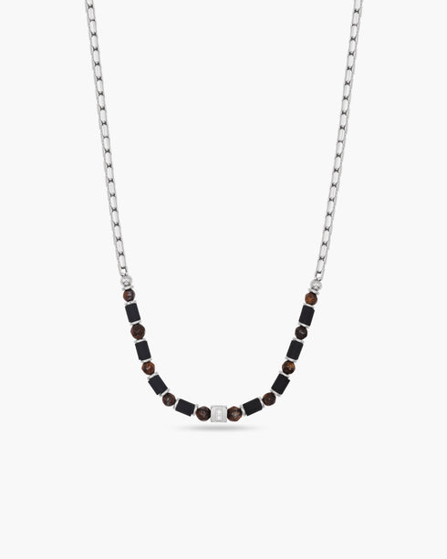 Necklace with black beads on a white background
