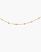 Gold necklace with star-shaped pendants on a white background