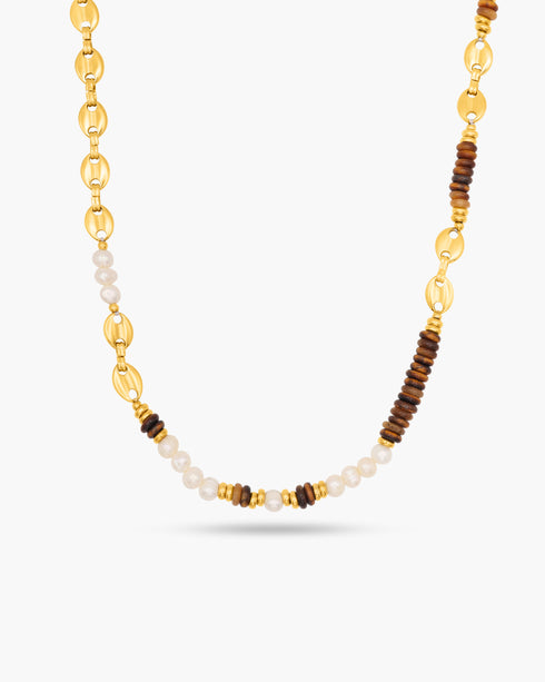 Necklace with gold, brown, and white beads on a white background
