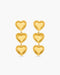 Gold heart-shaped earrings on a white background