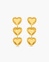 Gold heart-shaped earrings on a white background