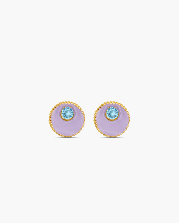 Pair of earrings with purple circular stones and gold accents on a white background