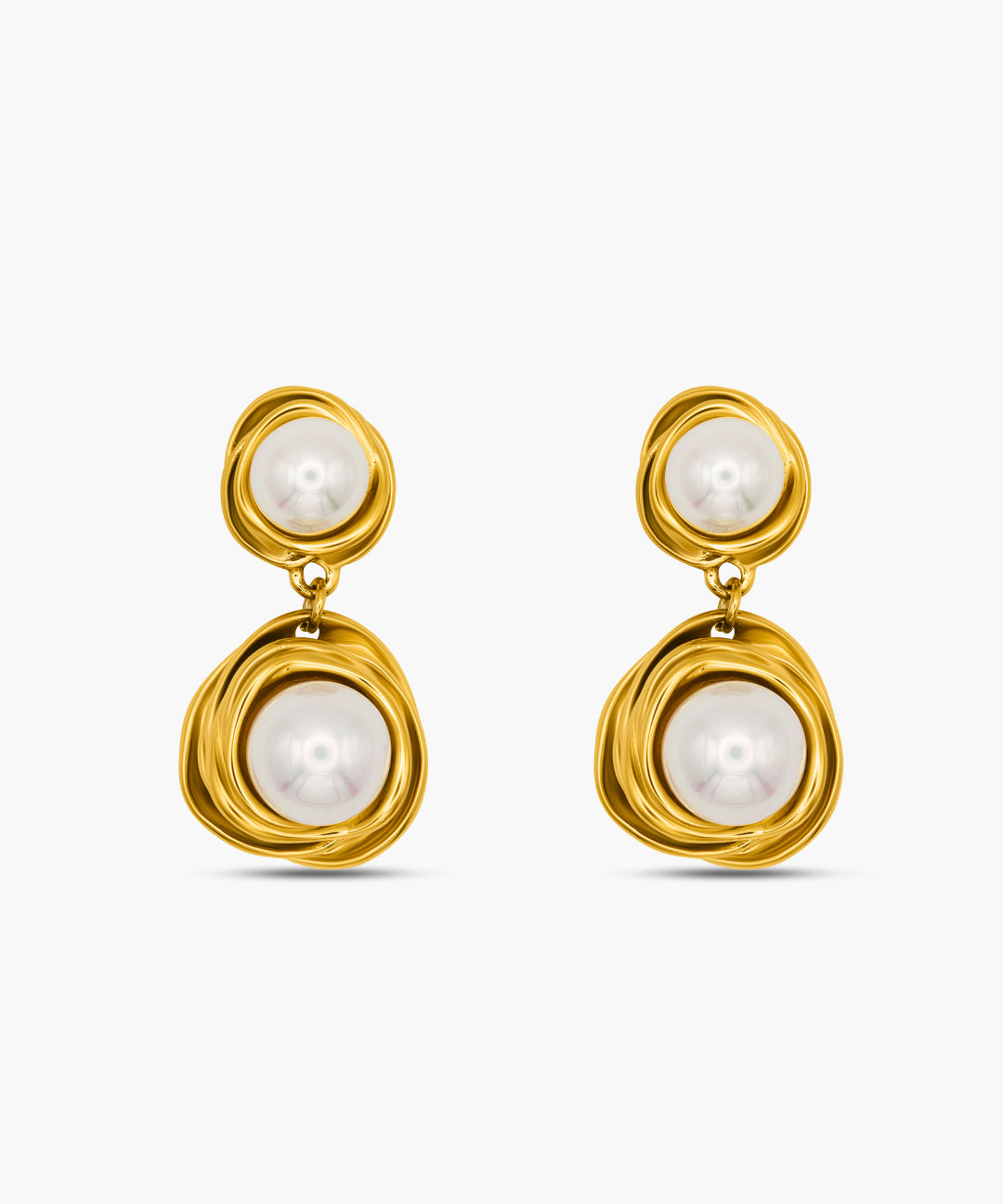 Gold earrings with pearl drops on a white background