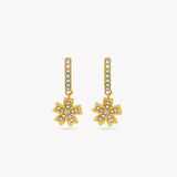 Gold flower-shaped earrings with clear stones on a white background