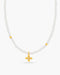 Necklace with white beads and a gold cross pendant on a white background