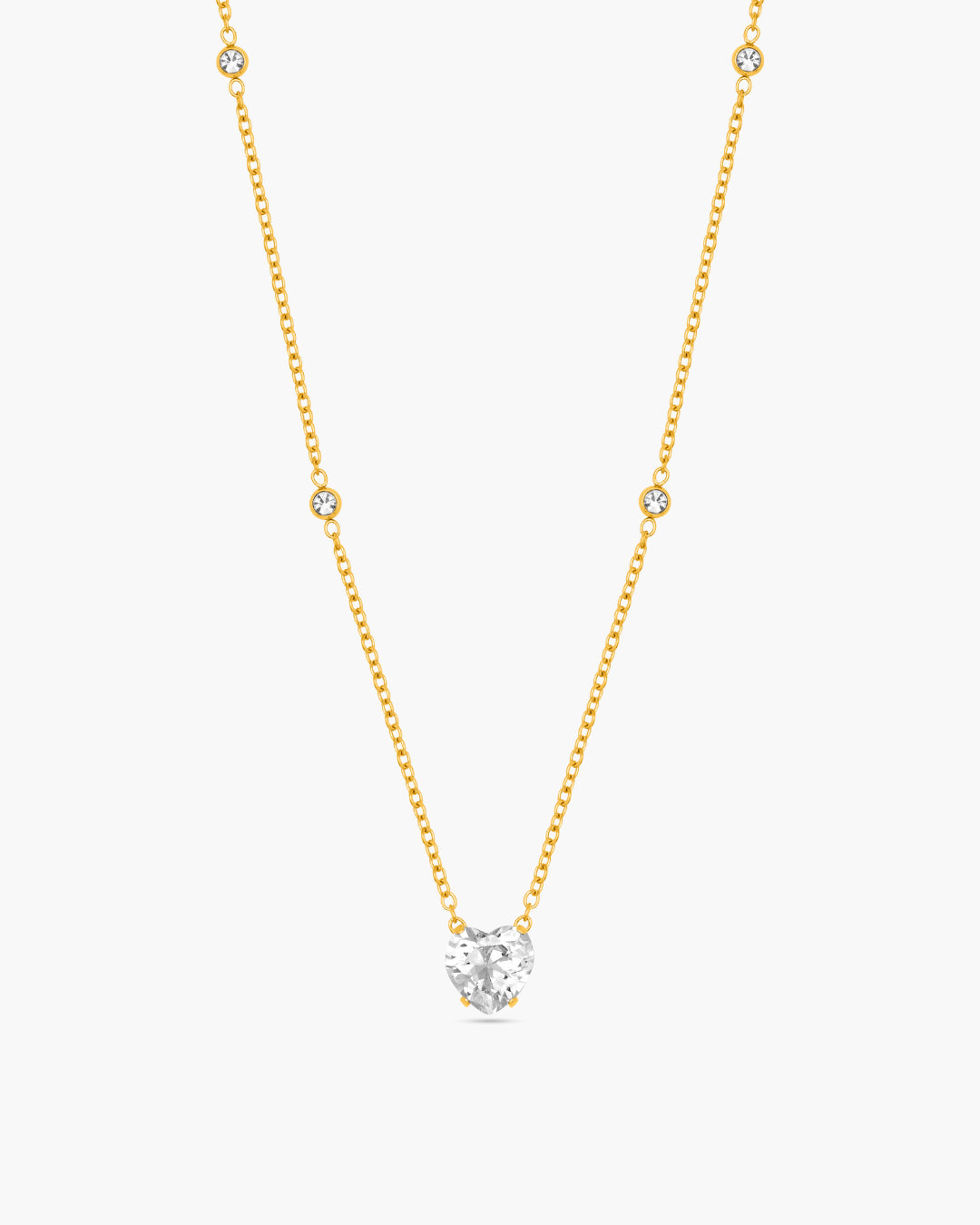 Gold necklace with a diamond pendant on a white background