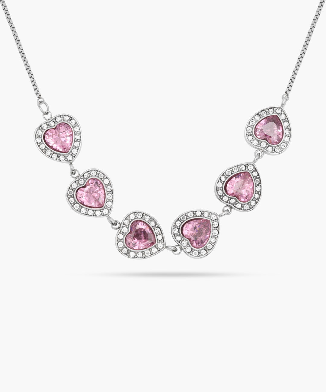 Necklace with pink heart-shaped stones on a white background