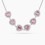Necklace with pink heart-shaped stones on a white background