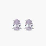 Pair of teardrop-shaped purple earrings on a white background