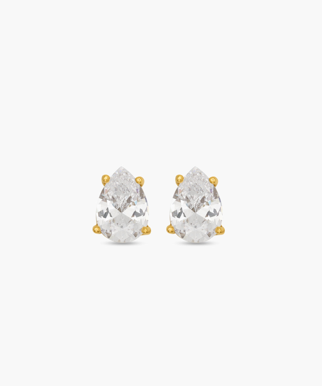 Pair of pear-shaped crystal earrings with gold accents on a white background