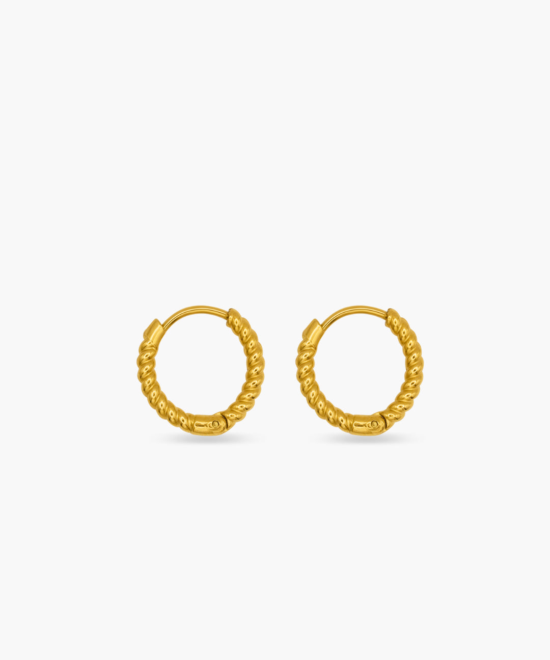 Gold hoop earrings on a white background