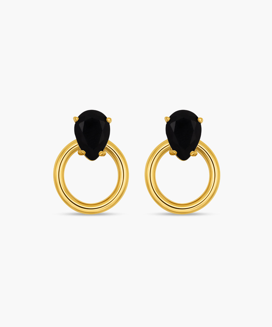 Gold hoop earrings with black gemstones on a white background