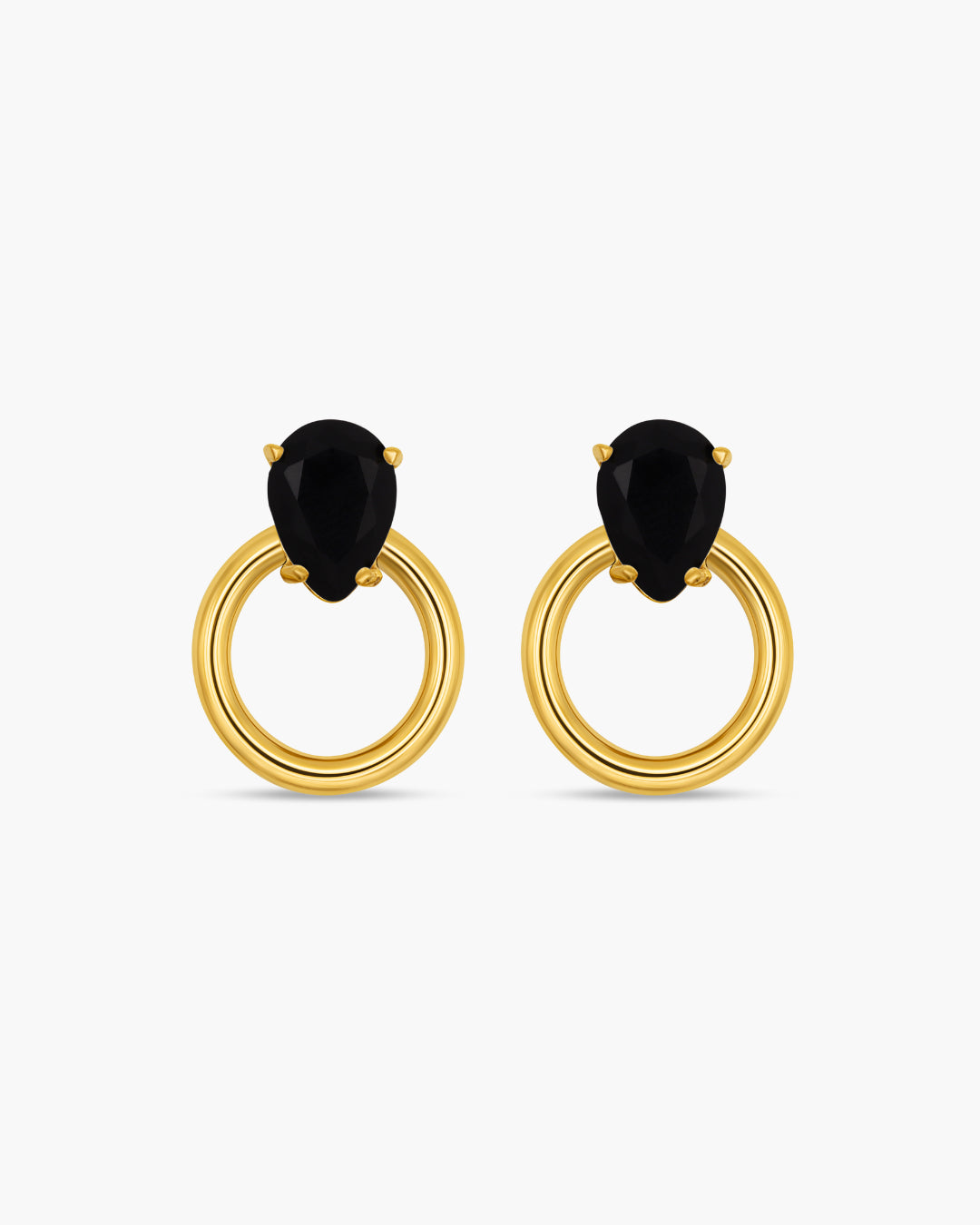 Gold hoop earrings with black gemstones on a white background