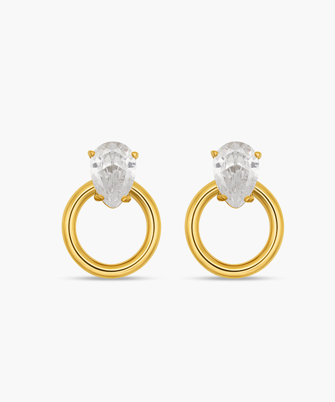 Gold hoop earrings with clear gemstones on a white background