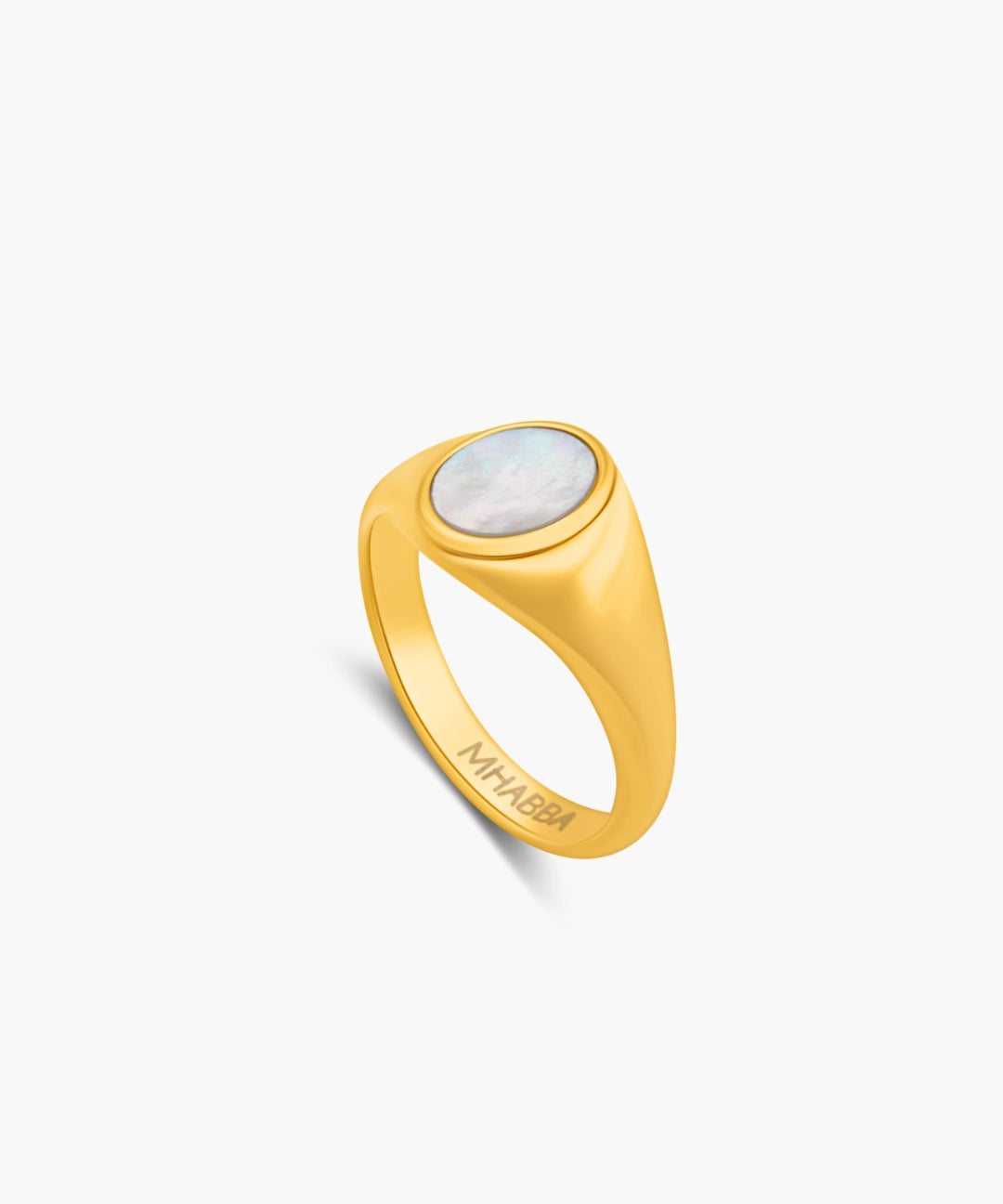 Gold ring with a central stone on a white background