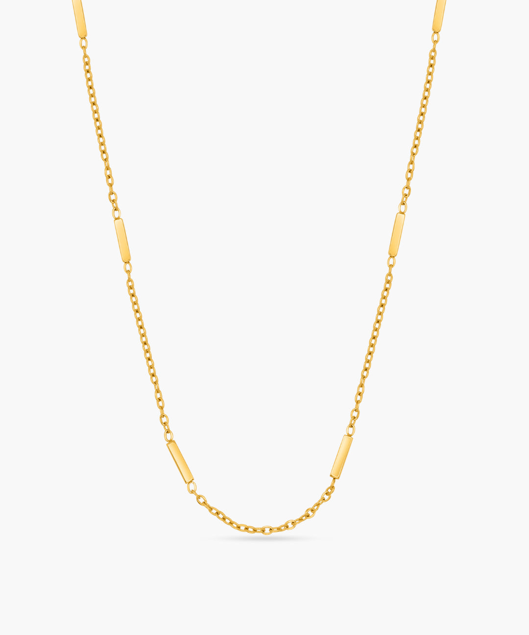 Gold chain necklace on a white background