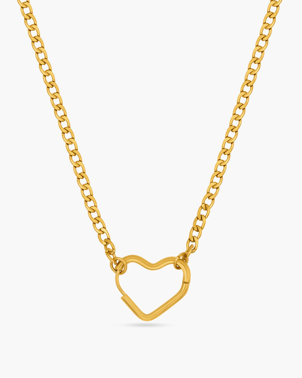 Gold heart-shaped pendant necklace on a white background