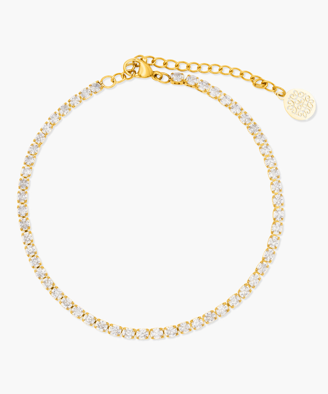 Gold anklet with clear stones on a white background