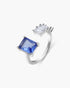 Silver ring with a blue gemstone on a white background