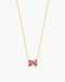 Gold necklace with a pink gemstone on a white background