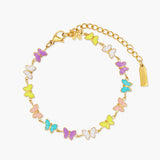 Gold bracelet with colorful butterfly charms on a white background