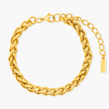 Gold chain bracelet on a white background