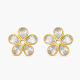 Gold flower-shaped earrings with clear gemstones on a white background