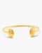 Yellow shell-shaped bangle on a white background