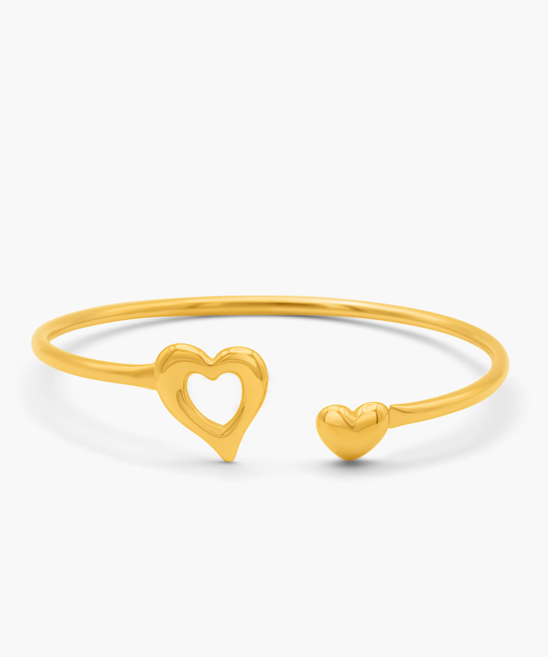 Gold bracelet with heart designs on a white background
