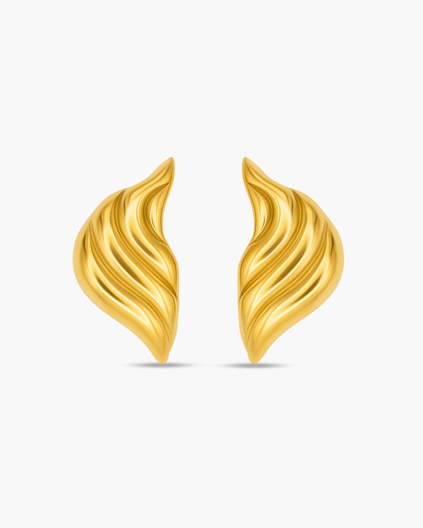 Pair of gold earrings on a white background