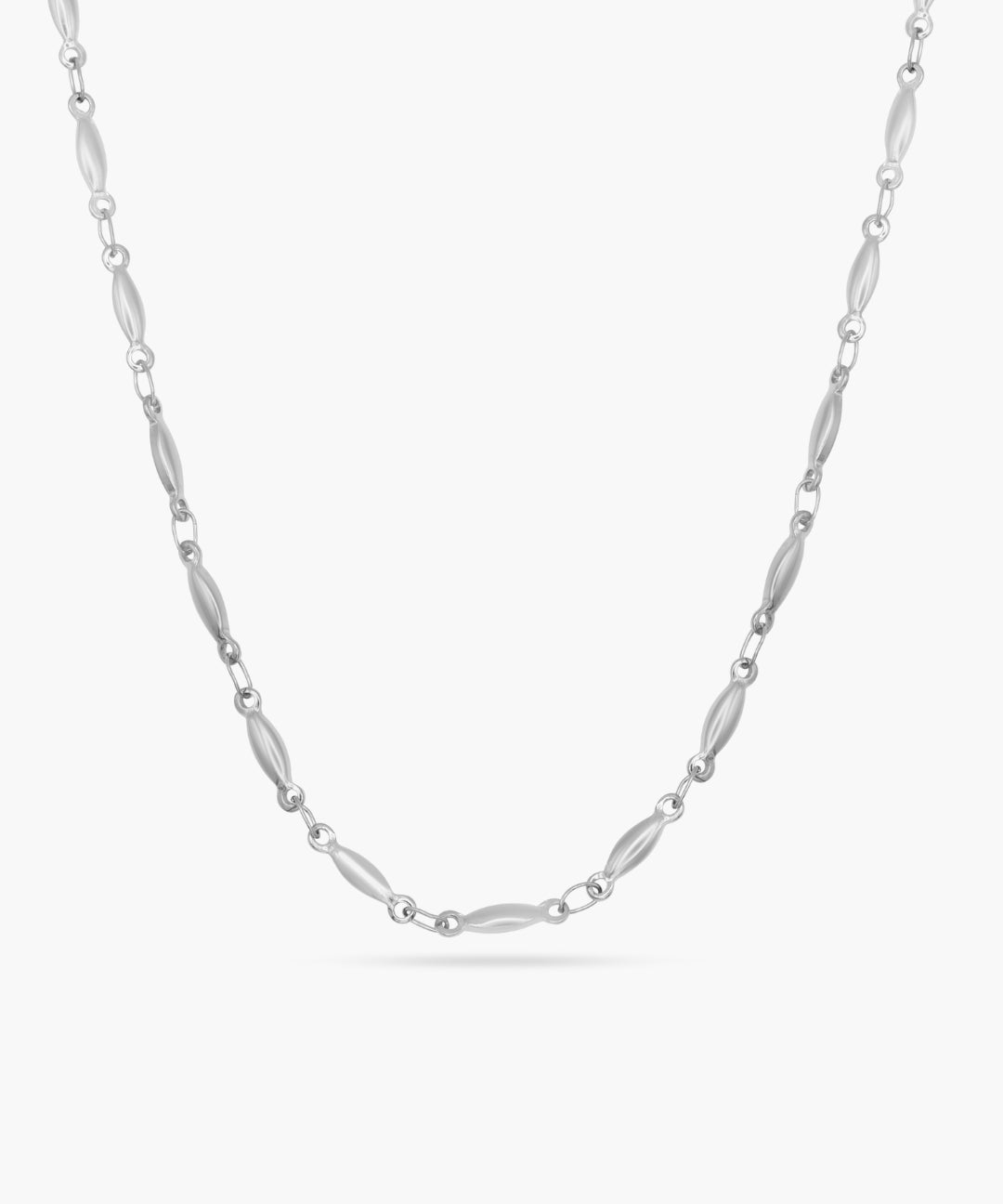 Silver chain necklace on a white background