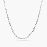 Silver chain necklace on a white background