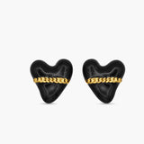 Black heart-shaped earrings with gold chains on a white background