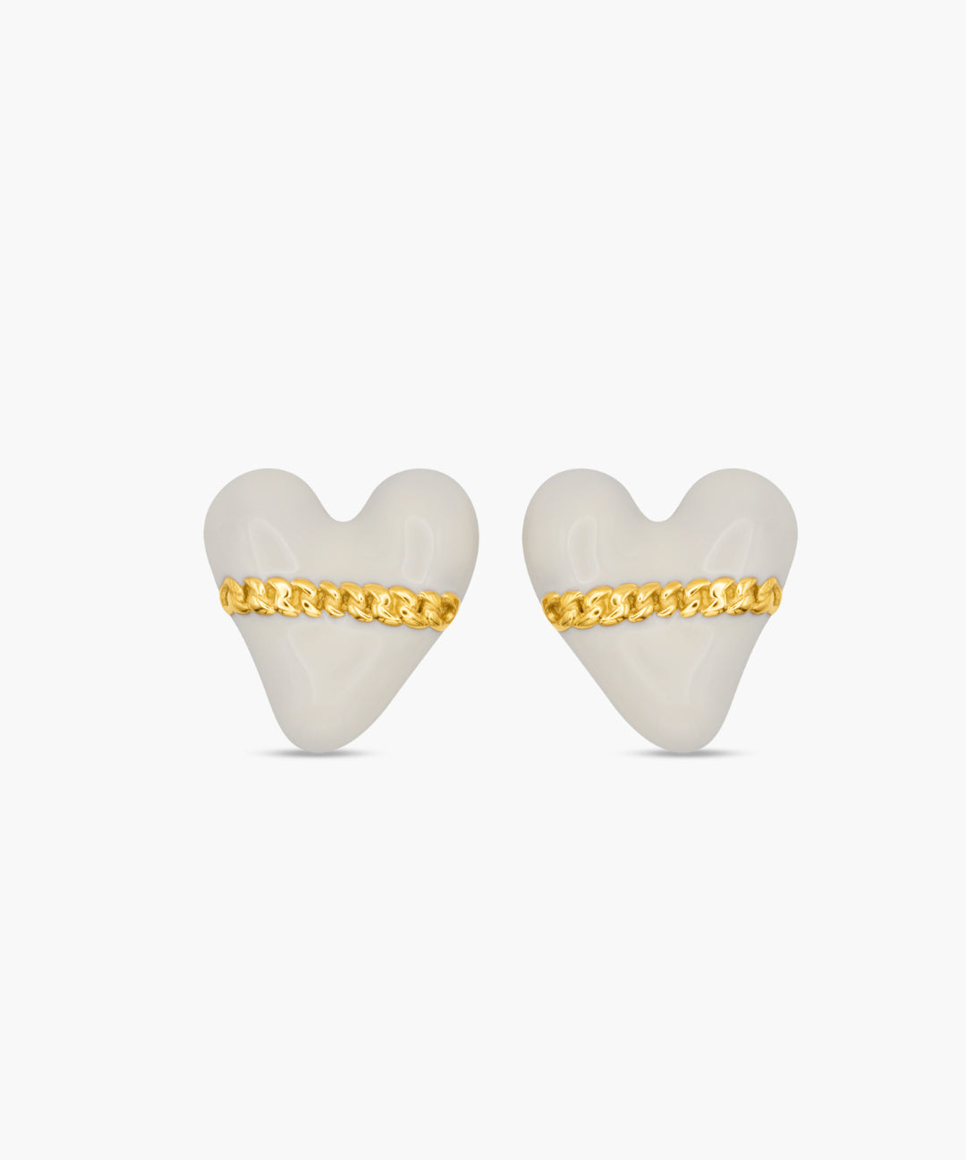 Heart-shaped earrings with gold chains on a white background