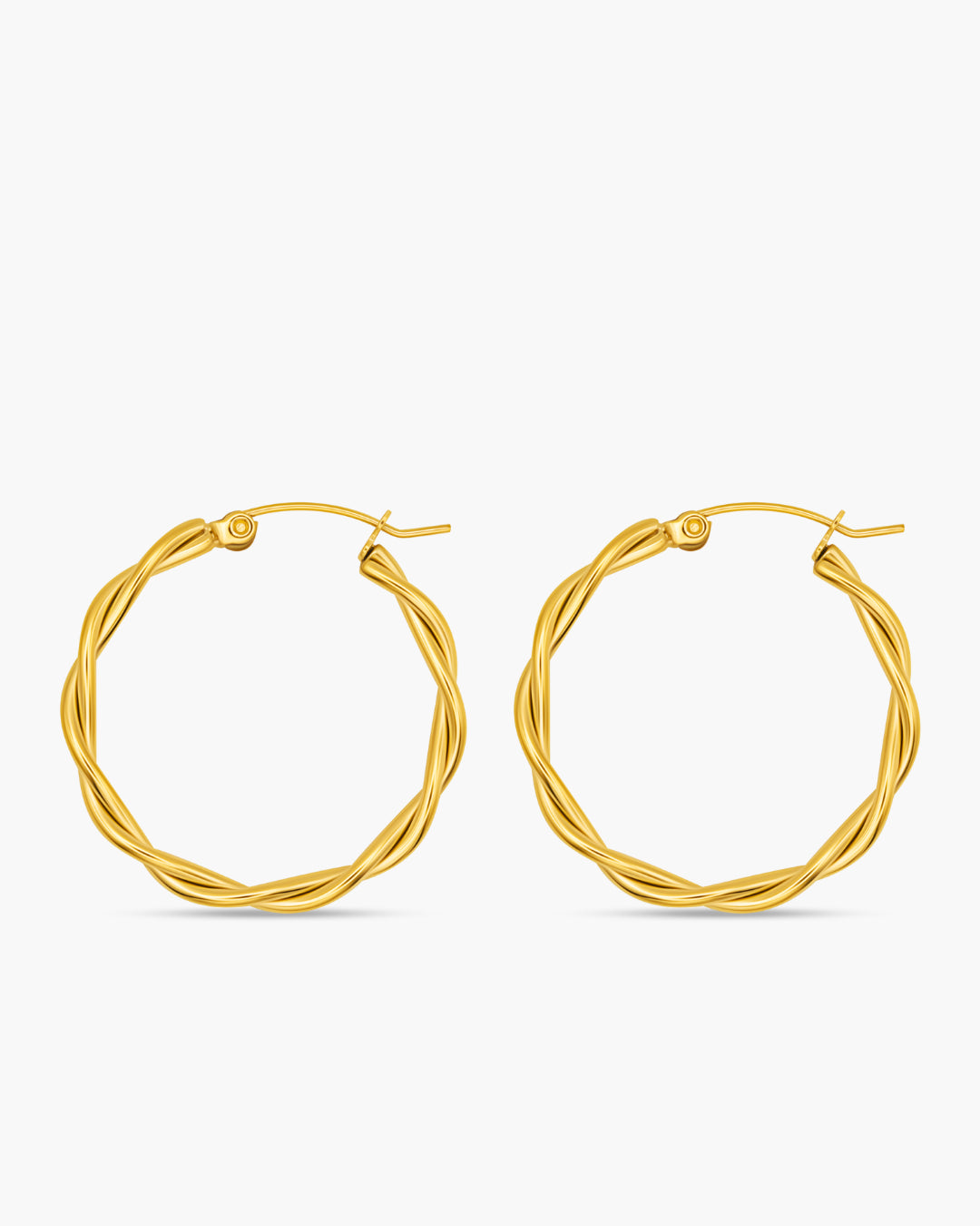 Pair of gold hoop earrings on a white background